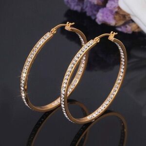 18K Yellow Gold Plated Stainless Steel earrings w/solid
Clear Cubic Zirconiam